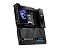 Фото-3 Материнская плата MSI MEG X870E GODLIKE, вид 3/4 со стороны задней панели: видны внешние порты на I/O, подсветка декоративной панели и массивный нижний кожух; важно для страницы &mdash; показывает расположение панели портов и габариты кожухов.