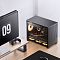 Фото-16 Корпус Jonsbo D32 Pro Black, корпус на столе рядом с монитором: через боковое стекло видны вентиляторы и видеокарта, сверху перфорированная крышка &mdash; чтобы показать корпус в типичном рабочем окружении.