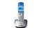 Фото-2 DECT‑телефон Panasonic KX‑TG2511RU: вид спереди, трубка на базе; сине‑белая трубка и серебристая база, синяя подсветка экрана, цифровые кнопки; на белом фоне — важно для оценки фронтального вида и цветового исполнения.