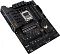 Фото-5 Материнская плата ASUS TUF GAMING B650‑E WIFI, вид сверху под углом: установленный кожух I/O, радиаторы VRM и радиатор M.2, 4 слота DDR5 и слоты PCIe; на белом фоне, чтобы увидеть расположение разъёмов и радиаторов.