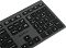 Фото-9 Клавиатура A4Tech FBX50C Grey, нижняя сторона корпуса; вид снизу с продольными рёбрами, четырьмя резиновыми ножками и служебными наклейками на чёрной панели. Изображение для карточки товара показывает основание и конструкцию корпуса.