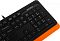 Фото-17 Клавиатура A4Tech F1010 (Orange), крупный план правой части: цифровой блок, навигационные клавиши и логотип A4Tech, виден край оранжевой подложки; фото помогает оценить наличие numpad и детали клавиш.