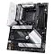 Фото-2 Материнская плата ASUS ROG Strix B550-A Gaming, вид сверху; чёрная плата с белыми и серебристыми радиаторами, сокет AM4, четыре DIMM-слота, усиленный слот PCIe x16 и декоративные надписи Strix; подходит для карточки товара, чтобы показать компоновку компонентов и оформление радиаторов.