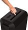 Фото-3 Уничтожитель бумаги Fellowes Powershred LX65, крупный план верхней панели на белом фоне: рука указывает на слот подачи, рядом ползунок режимов и индикаторы; важно для понимания, где переключаются режимы и как выглядит зона подачи бумаги на странице товара.