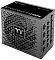 Фото-3 Блок питания Thermaltake Toughpower TF3 1300W, фронтальный вид под углом; показаны лицевая решётка вентилятора, боковая надпись ATX 3.1 Titanium и часть панели модульных разъёмов; корпус чёрный. Важно для карточки товара, чтобы показать компоновку корпуса и форм-фактор подключения.