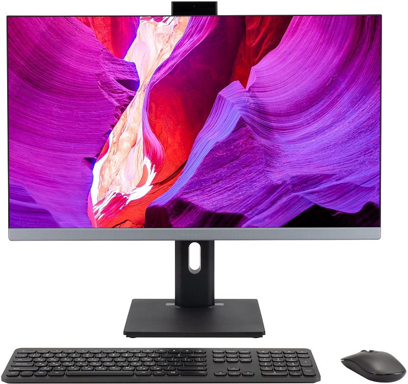 Фото-1 Моноблок Digma Pro Unity 27 DM27P5-ADXW05, вид спереди с клавиатурой и мышью; чёрный корпус с тонкими рамками, выдвижная камера сверху, серая нижняя планка и прямоугольная подставка со стойкой с овальным вырезом; изображение показывает фронтальную компоновку и комплект для страницы моноблока.