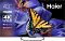 Фото-1 Телевизор Haier Smart TV S4 43 &mdash; фронтальный вид с включённым экраном; показаны тонкие рамки, серебристая нижняя кромка, центральная опора и изображение бабочки на фоне фиолетовых цветов с техническими значками 4K Ultra HD и Dolby Atmos; фото важно для идентификации модели на странице товара.