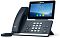 Фото-4 IP-телефон Yealink SIP-T58W, ракурс спереди-слева; чёрный корпус, большой сенсорный экран, трубка слева и цифровая клавиатура по центру, видна подставка — важно для понимания формы корпуса и посадки трубки у модели.