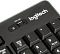 Фото-3 Клавиатура Logitech MK270, крупный план верхнего правого угла: переключатель питания OFF/ON рядом с логотипом Logitech, видны клавиши цифрового блока и Num Lock, чёрный пластик на белом фоне для пояснения элементов управления на странице товара.