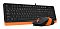 Фото-11 Комплект клавиатура и мышь A4Tech F1010 (Orange), ракурс под углом: клавиатура с русской раскладкой и мышь с оранжевой боковой вставкой, белый фон; фото уточняет дизайн и цвет комплекта на странице товара.