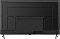 Фото-4 Телевизор Digma DM-LED50UBB41 50, вид сзади; центральный монтажный блок, прямоугольные панели корпуса, нижняя зона динамиков и крепления ножек; чёрная задняя часть корпуса с серебристыми ножками; фото помогает оценить заднюю конструкцию и места крепления.