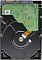 Фото-3 Жёсткий диск Western Digital WD Purple WD64PURZ 3.5" &mdash; вид снизу: зелёная печатная плата, крепёжные винты, чёрное основание и видимый край SATA‑контактов, оранжевый шлейф на белом фоне; важно для понимания конструкции и ориентации при установке.