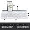 Фото-2 Клавиатура Logitech K580 920‑009209, крупный план сверху: белые квадратные клавиши с серой маркировкой, русско‑латинская раскладка, серая верхняя планка с продольным пазом и логотип logi справа; изображение на светлом фоне для карточки товара, показывает раскладку и верхнюю подставку корпуса.