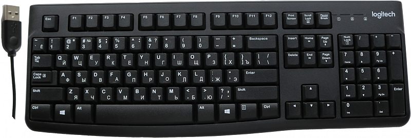 Фото-1 Клавиатура Logitech K120, вид сверху с подключённым кабелем. На фото показана полноразмерная проводная клавиатура с цифровым блоком, русско-английской раскладкой, отдельным блоком стрелок и логотипом Logitech в правом верхнем углу. Чёрный корпус помогает увидеть полную компоновку клавиш на странице товара.