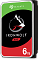 Фото-2 Жёсткий диск Seagate IronWolf ST6000VN001, вид снизу; зелёная печатная плата и основание корпуса показывают конструкцию накопителя.