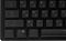 Фото-6 Механическая клавиатура MSI Forge GK320, крупный план левого буквенного блока; видны клавиши Tab, Caps, Shift и ряды QWERT, двойная кириллическая и латинская маркировка, чёрные кейкапы; изображение показывает читаемость символов для страницы товара.