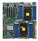 Фото-1 Материнская плата Supermicro X13SAQ &mdash; вид сверху: зелёная PCB с установленными защитными крышками на сокетах, группы слотов памяти с синими защёлками и несколько PCIe‑слотов; важно для понимания компоновки платы при сборке системы.