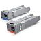 Фото-1 Трансивер SFP+ Ubiquiti UACC‑OM‑SM‑10G‑S‑2, комплект из двух модулей: на торцах прямоугольные порты, снизу цветные вставки (синяя и оранжевая), на корпусах наклейки со штрих‑кодами. Изображение на странице товара важно, чтобы увидеть комплектность и различие модулей по цветовой маркировке.