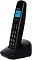 Фото-2 Радиотелефон DECT Panasonic KX-TGB610, трубка на базе, вид под углом; показана боковая текстура/ребристость корпуса и расположение клавиш; чёрный корпус на белом фоне — для понимания формы и посадки в зарядной базе на странице товара.