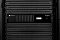 Фото-10 ИБП Systeme Electric Smart-Save SMT SMTSE1000RMI2U, фронтальный вид в стойке по центру кадра. Видны симметричное размещение в rack-направляющих, дисплей на правой части и вентиляционные прорези на левой части передней панели. Подходит для карточки товара, потому что показывает лицевую панель в реальном стойковом контексте.