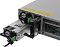 Фото-16 Сервер iRU G2208IG3 8x3.5 Rack 2U, демонстрация корзины накопителя; выдвинутая чёрная салазка 3,5 дюйма показана перед передней панелью с восемью отсеками, рядом видны лотки HDD0–HDD3 и блок кнопок слева; важно для страницы товара, потому что показывает доступ к дисковому отсеку.