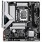 Фото-1 Материнская плата Gigabyte B860M EAGLE V2, вид сверху: чёрная mATX плата с серебристыми радиаторами и кожухом I/O, сокет LGA1851, два слота памяти и один усиленный длинный слот PCIe; важно для страницы &mdash; показывает компоновку элементов на mATX.