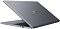Фото-6 Ноутбук HONOR MagicBook X16 2026 BRG-X 5301ARGN, вид сзади на полуоткрытую крышку. Видны гладкая крышка графитового цвета с логотипом HONOR по центру, тонкий профиль и боковой USB-порт. Фото важно для страницы товара, так как показывает внешний вид крышки и форму корпуса.