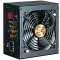 Фото-4 Блок питания для ПК Zalman TeraMax II SE 1000W, вид сзади и спереди под углом; чёрный корпус с круглой решёткой вентилятора, сетевым разъёмом, выключателем и цветными элементами внутри за перфорацией; фото помогает оценить заднюю панель и вентиляцию в карточке товара.