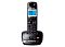 Фото-2 DECT-радиотелефон Panasonic KX-TG2521RU, трубка на базе вид спереди, чёрный корпус, синий экран, центральный навигационный джойстик и цифровые кнопки, на базе видна крупная кнопка