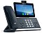 Фото-2 IP‑телефон Yealink SIP‑T58W with Camera, ракурс 3/4: трубка на базе, сенсорный экран под наклоном и блок кнопок под дисплеем; чёрный цвет. В карточке товара показывает, как устройство выглядит на столе и угол обзора экрана.