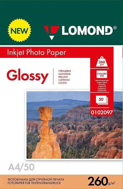 Фото-1 Фотобумага Lomond 0102097 A4 50 листов 260 г/м²: лицевая сторона упаковки «Inkjet Photo Paper Glossy», зелёная верхняя полоса Lomond и красный блок с параметрами, фото скального пейзажа; на белом фоне, важно для выбора глянцевой бумаги A4 по плотности и количеству.