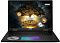 Фото-1 Ноутбук MSI Titan 18 HX AI A2XWJG-205RU, вид спереди в открытом положении; RGB-клавиатура, большой тачпад с цветной панелью и круглая декоративная вставка на левой части подладонника; студийное фото на белом фоне, важно для понимания внешнего вида модели.