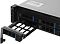 Фото-14 Сервер iRU g2208ig3 8x3.5 Rack 2U, вид с частично выдвинутой дисковой корзиной; чёрный лоток с ручкой вынут из передней панели, фото показывает способ замены накопителя спереди.