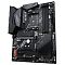 Фото-3 Материнская плата Gigabyte B550 Aorus Elite V2, вид сверху: чёрный текстолит, массивные радиаторы в зоне VRM и на чипсете, четыре слота памяти и сокет AM4; на белом фоне, показывает компоновку и охлаждение для карточки товара.