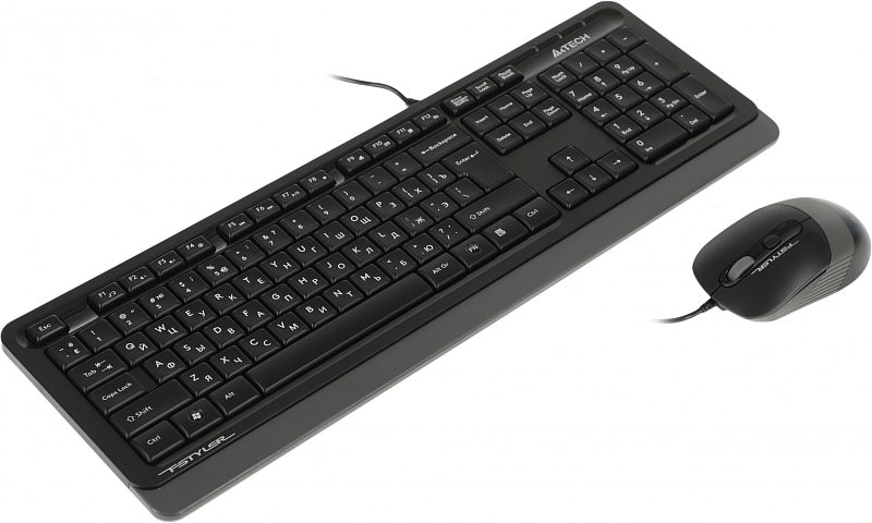 Фото-1 Комплект клавиатура и мышь A4Tech F1010 Grey, общий вид под углом: чёрная клавиатура и проводная мышь на белом фоне, заметны серые акценты; изображение помогает оценить внешний вид набора на странице товара.