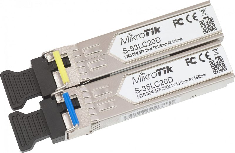 Фото-1 Трансивер MikroTik S-3553LC20D (набор), фото двух SFP‑модулей рядом: металлические корпуса с наклейками S-53LC20D и S-35LC20D, чёрные заглушки оптических портов, цветные скобы фиксаторов (жёлтая и синяя); на белом фоне — показывает комплект из двух модулей и их маркировку.