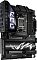 Фото-2 Материнская плата ASUS ROG Crosshair X870E Hero, вид спереди под углом: плата показана с высоким кожухом задней панели и встроенным экраном, видны радиаторы M.2 и усиленные слоты PCIe; фото важно для страницы, чтобы показать объём конструкции и расположение элементов.