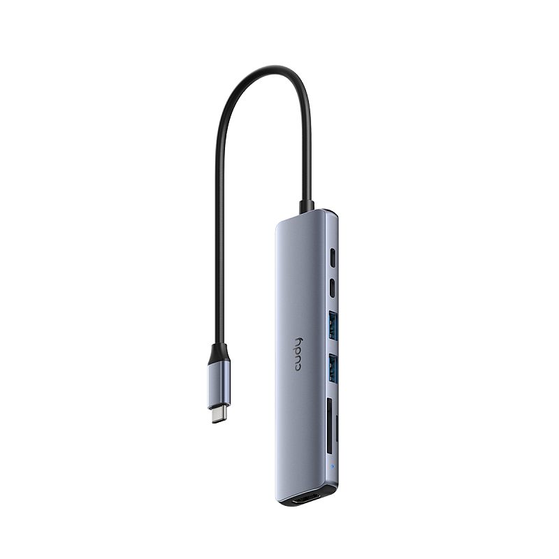 Фото-1 Порт-репликатор Cudy UH407, общий вид; серебристый корпус с кабелем USB‑C, на боковой панели видны два USB‑C, два USB‑A (синие), слот для карты и индикатор — важно для проверки наличия портов USB и кардридера.