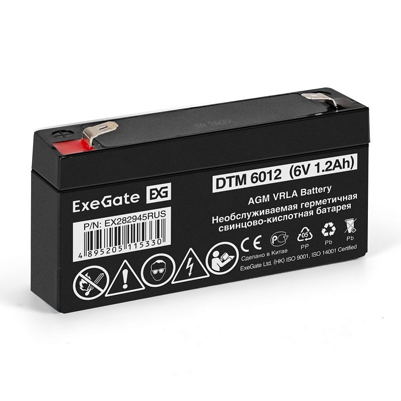Фото-1 Батарея для ИБП ExeGate DTM 6012 EX282945RUS, вид спереди под углом: узкий чёрный корпус, верхние плоские клеммы, фронтальная маркировка 6V 1.2Ah и предупреждающие пиктограммы, на белом фоне для страницы товара и сравнения компактного форм‑фактора аккумулятора.