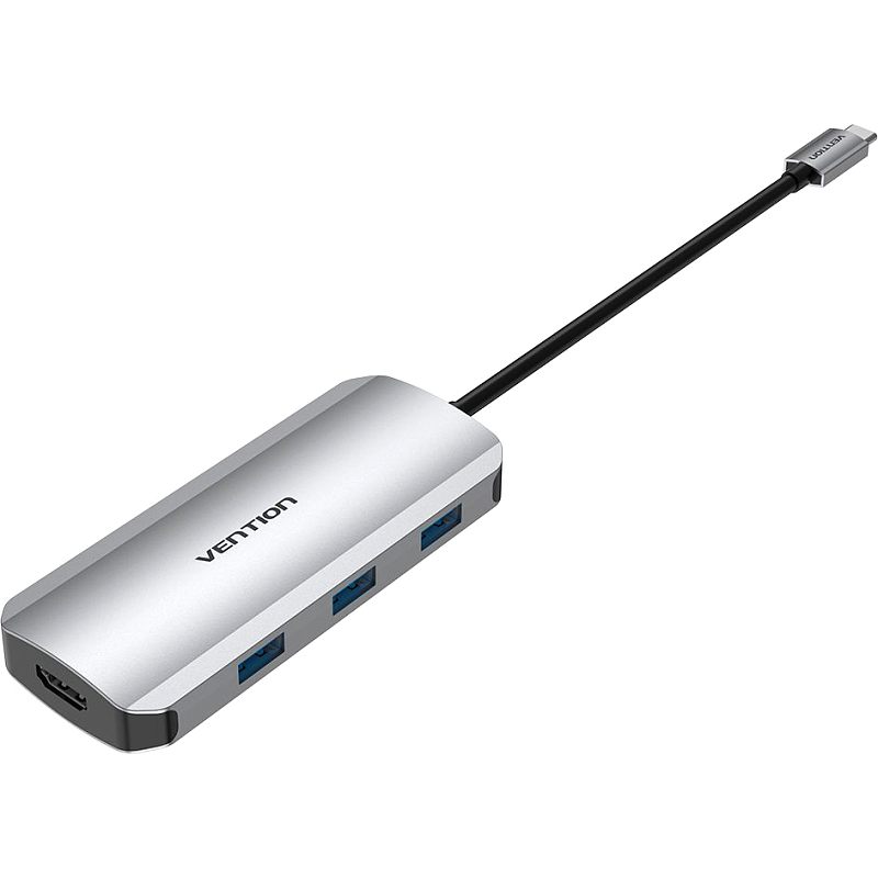 Фото-1 Порт-репликатор Vention TOJHB, вид сверху под углом: серебристый алюминиевый USB‑C хаб с кабелем, на боковой грани 3 порта USB‑A с синими вставками и HDMI; на белом фоне — показывает набор разъёмов для подключения периферии и монитора к ноутбуку.