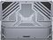 Фото-11 Ноутбук MSI Titan 18 HX AI A2XWJG-206RU, нижняя крышка корпуса; серебристо-серая панель с множеством перфораций и решёток охлаждения, надпись TITAN и отметка Dynaudio, голубые вставки; на белом фоне, важно для понимания вентиляции и конструкции днища.