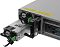 Фото-16 Сервер iRU g2208ig3 8x3.5 Rack 2U, вид с выдвинутыми блоками питания и пустым задним лотком; показаны зелёные фиксаторы, модуль питания и задняя часть корпуса, фото показывает сервисный доступ к серверу.