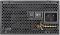 Фото-6 Блок питания Thermaltake Toughpower TF3 1300W, задняя панель крупным планом; видны вентиляционная соты, разъём питания IEC, клавиша включения и отдельная кнопка OCM; корпус чёрный. Подходит для страницы товара и помогает увидеть органы управления на задней стороне.