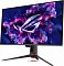 Фото-5 Монитор ASUS PG32UCDM3, вид спереди справа под углом; тонкий чёрный экран, графика ROG и трёхлучевая подставка с красной подсветкой у основания; фото показывает другой фронтальный ракурс монитора.
