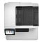 Фото-3 МФУ HP Color LaserJet Enterprise M480, вид сверху: тёмная крышка автоподатчика и секции подачи документов, слева виден экран управления; показывает конструкцию верхнего блока подачи/сканирования.