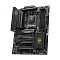 Фото-4 Материнская плата MSI MAG X870 Tomahawk WiFi, вид спереди под углом: показаны массивные радиаторы, четыре слота памяти, несколько слотов M.2 под радиаторами и усиленные PCIe-слоты; изображение помогает оценить конструкцию платы и зону охлаждения.