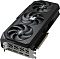 Фото-4 Видеокарта GIGABYTE AMD Radeon RX 9070 XT, вид под углом с верхней гранью; на фото три вентилятора, верхняя кромка с надписью Radeon, выступающий радиатор и слева видны порты на интерфейсной планке; изображение показывает верхнюю часть корпуса и боковую маркировку.