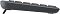Фото-6 Клавиатура Logitech K250, боковой вид с поднятой ножкой; показаны тёмно-серый корпус, наклон основания и ступенчатый профиль рядов клавиш. Полезно для страницы товара, чтобы показать регулировку наклона и толщину корпуса.