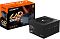 Фото-7 Блок питания Gigabyte GP-UD1000GM, комплект с упаковкой: оранжево-чёрная коробка UD Gold 1000W и сам блок питания, поставленный рядом под углом; изображение показывает внешний вид упаковки и корпуса на одной сцене.
