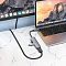 Фото-5 USB-C хаб Hoco HB27 на рабочем столе: подключён к ноутбуку, к хабу подключены USB-устройство и кабель, рядом монитор; фото демонстрирует использование хаба для подключения периферии и внешнего экрана через HDMI.